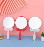 Miroir de maquillage à poignée circulaire avec nœud papillon, miroir de beauté portable, miroir de maquillage créatif avec impression de logo, vente en gros