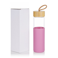 Bouteille d'eau en verre portable de haute qualité de 550 ml avec manchon en silicone et couvercle en bambou