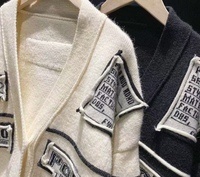 Cárdigan de Cachemira para mujer, suéter de punto de manga larga con cuello en V de Color sólido con bolsillo y patrón de letras, stock de moda disponible