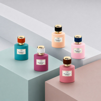Flacon de parfum vide cylindrique artistique et coloré de 50 ml, personnalisé, luxueux, unique, avec couvercle doré, en verre, avec boîte cadeau