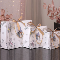 Sac en papier cartonné ivoire de haute qualité, imprimé sérigraphié, recyclable, vente directe d'usine Angel, idéal pour vêtements, chaussettes et chaussures