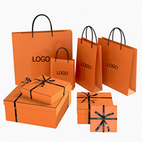 Sac en papier recyclé imprimé personnalisé Emballage de tissu écologique Emballage de shopping personnalisé de qualité supérieure Boîtes en papier de qualité supérieure