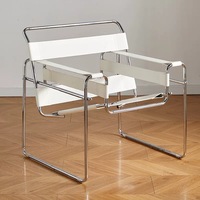 Fauteuil design Mid-Century en cuir blanc, structure en acier inoxydable, chaise de salon en cuir de vachette pour le salon