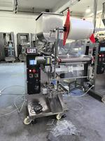 Machine d'emballage automatique VFFS pour sachets de liquides avec trémie de remplissage et de scellage à agitation chauffée en acier inoxydable 304 pour sauces, confitures et miel