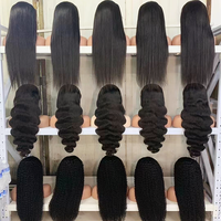 Prix direct longue durée de vie Service 12 A Grade 100 brut vierge non transformés indien cheveux bouclés frontal dentelle perruques vendeurs de l'Inde