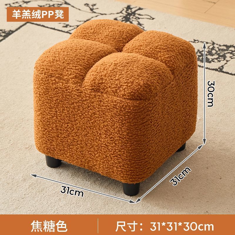 Caramel-colored lambswool stool