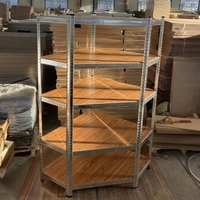 Étagère de rangement industrielle en acier durable à 4 niveaux en forme de L pour entrepôt et présentation en magasin