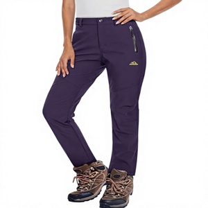 Pantalon de ski pour femme en polyester violet avec poches zippées et design respirant pour les activités de plein air - Product Image 1