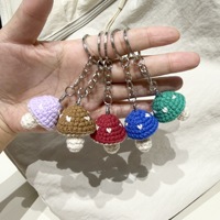 Produits en laine crochetée faits main en forme de champignons - Sacs, pendentifs pour téléphone, décorations modernes de style ferme pour Pâques et baptême