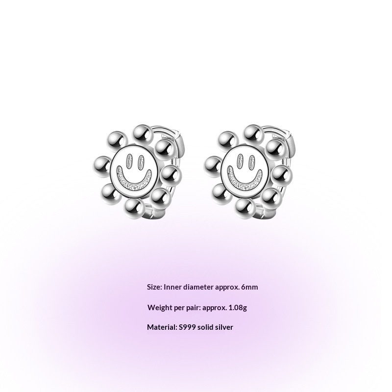 Smiley face earrings, a pair