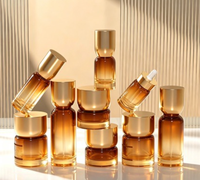 Set Kemasan Kosmetik Mewah Unik dengan Logo Custom, Botol Pompa Serum dan Krim Kaca Matte Pink Kosong untuk Perawatan Kulit
