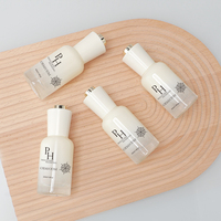 Bouteilles rondes de sérum en verre de luxe de 30ml 45ml 1oz en gros compte-gouttes à bouton-poussoir vide huile essentielle et crème de soin de la peau goutte pour les yeux