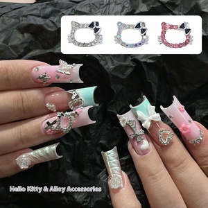 Venta al por mayor: Nueva decoración de <span class=keywords><strong>uñas</strong></span> 3D de <span class=keywords><strong>Hello</strong></span> <span class=keywords><strong>Kitty</strong></span> con lazo de diamantes y perlas huecas para accesorios DIY - Product Image 3