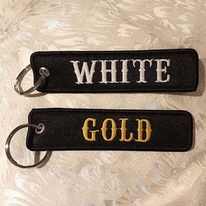 LCC1335 Wholesale Custom logo Flight Embroidered Keychain Keytag Fob Remove Flight Before Flight Woven Logo Custom Anime Jet Tag - Product Image 1