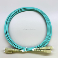Kabel Patch Fiber Optik Multimode Duplex 3M SC ke SC OM3 50/125μm Konektor SC/UPC Aqua Fiber Optic untuk Jaringan 10G (Laris Terjual)