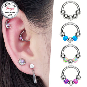 Pendientes de <span class=keywords><strong>Aro</strong></span> de Titanio G23 de Diseño para <span class=keywords><strong>Mujer</strong></span>, con Esfera de Ópalo para Piercings de Nariz, Rook, Daith, Labret y Joyería Corporal al por Mayor - Product Image 1