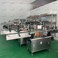 Machine d'étiquetage de bouteilles rondes de haute précision FKJX avec écran tactile PLC pour les contenants de liquides chimiques quotidiens