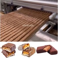 Machine de fabrication de barres protéinées au nougat, machine à fabriquer des barres énergétiques aux céréales et au chocolat, ligne de production de barres aux céréales Snickers