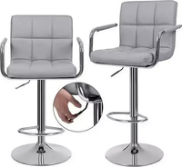 Chaise de bar pivotante moderne de luxe avec accoudoirs et repose-pieds, en cuir PU et tissu, avec base en métal