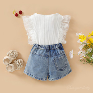 Set 2 Pezzi <span class=keywords><strong>Abbigliamento</strong></span> Bambina: Top Giallo con Stampa <span class=keywords><strong>Margherita</strong></span> e Pantaloncini in Denim Elasticizzato con Rete - Collezione Dolce per Bambine - Ingrosso <span class=keywords><strong>Abbigliamento</strong></span> Bambini - Product Image 3