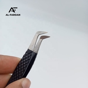 Pinzas para extensión de pestañas AL-FARDAN INSTRUMENTS Russian Volume Boot, con efecto degradado en blanco y negro y agarre de diamante. - Product Image 1