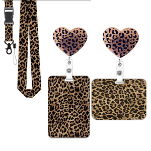 Brown leopard print glitter with alligator clip, retractable <b>ID</b> card <b>holder</b> with alligator clip, badge scroll, lanyard. - Product Image 1