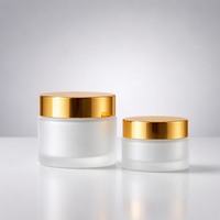 Pots en verre givré personnalisés pour crème de soin avec couvercle doré en tailles 30g/50g/100g pour l'emballage de crème pour le visage