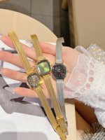 Montre à quartz pour femme de style moderne, de luxe, de qualité supérieure, étanche, promotionnelle, avec bracelet en acier inoxydable, modèle 79