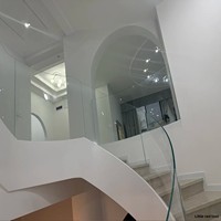 Escalier en fer courbé rotatif avec installation porte-à-porte pour villas de luxe, clubs et maisons auto-construites