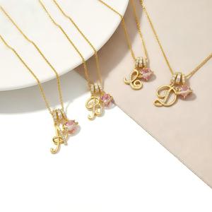 Collier à 26 lettres tendance sur TikTok, plaqué or 18 carats, chaîne en acier inoxydable pour femmes - Product Image 1