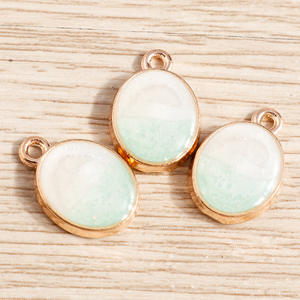 10 piezas por paquete: Nuevo colgante <span class=keywords><strong>de</strong></span> joyería <span class=keywords><strong>de</strong></span> <span class=keywords><strong>jade</strong></span> ovalado con efecto <span class=keywords><strong>de</strong></span> goteo <span class=keywords><strong>de</strong></span> aceite en aleación. - Product Image 6