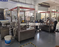 Machine de remplissage et de sertissage automatique de parfum à 4 buses, équipement de mise en bouteille d'huile essentielle avec système d'étanchéité en feuille d'aluminium