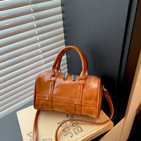 Nouveau sac Boston pour femme en cuir PU, sac à main cylindrique avec bandoulière, petit sac bandoulière pour les voyages et le quotidien