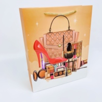 Sac en papier pliable écologique de grande taille personnalisé Sac d'emballage shopping de cadeau pour femmes doré à la mode avec logo personnalisé