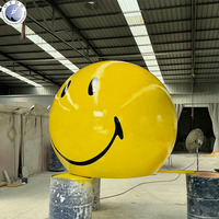 Sculpture de boule en fibre de verre avec visage souriant, statue en résine sur mesure grandeur nature, décoration de jardin, parc, paysage extérieur pour usage commercial