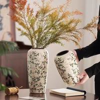 Vase en céramique de style chinois rétro, faux antique, luxe léger, haut de gamme, arrangement floral, décoration de salon avec un design simple