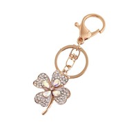 Porte-clés trèfle à quatre feuilles porte-bonheur en strass, breloque de sac incrustée de cristaux, anneau porte-clés multicolore, cadeau souvenir porte-bonheur pour femmes et amies