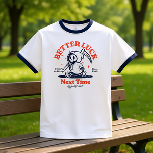 T-shirt Better Luck Next Time bianca con bordi blu navy, design grafico, abbigliamento promozionale - Product Image 3