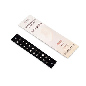 I semi dell'orecchio di cristallo del drago e della nuvola sono impreziositi con cristalli dai semi Swarovski - Ear per la terapia di agopuntura - Product Image 1