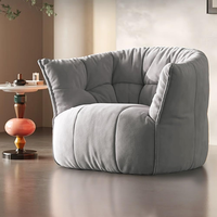 Fauteuil individuel rembourré en tissu chenille moderne et confortable, garni d'éponge, sans structure, idéal pour appartement et hôtel