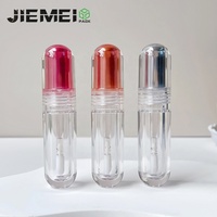 JIEMEI Stock Unique Capsule Forme 3ML Rond Brillant à Lèvres Bouteille Métallique Bouchon Vente en Gros de Luxe Vide Tube de Glaçure à Lèvres Conteneur