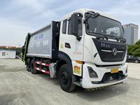 Camion benne compacteuse de déchets robuste de 20 mètres cubes avec double pompe, réservoir d'égouts et grande benne arrière à chargement par tombée