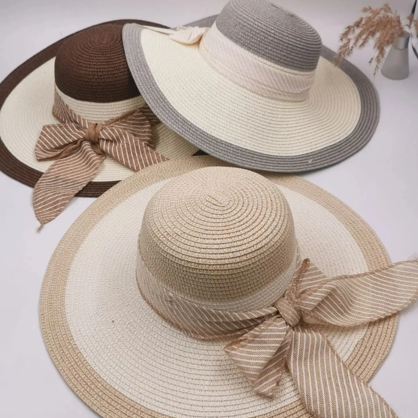 Cappelli di paglia all'ingrosso estivi all'aperto a buon mercato cappelli di paglia a tesa larga per le donne