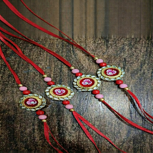 Handmade Meenakari Rakhi Set for Raksha Bandhan Crafted Premium <b>Red</b> <b>Silk</b> Thread Wristbands Decorated with Festive Beads - Product Image 1
