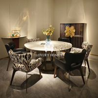 Ensemble de table à manger en marbre rond et élégant de luxe avec 6 chaises Mélange élégant de revêtement en cuir noir et imprimé léopard