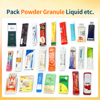 Machine d'emballage verticale pour sachets à quatre soudures latérales, type stick pack, avec fonctions de formage, de remplissage et de scellage