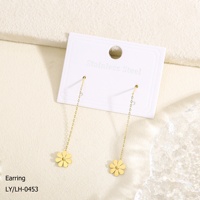 Boucles d'oreilles élégantes et raffinées en acier inoxydable plaqué or 18 carats, hypoallergéniques, avec long pendentif fleur, finition polie, pour femme