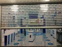Rouleau intérieur de style moderne à taille personnalisée Volet roulant en polycarbonate transparent de haute qualité pour centre commercial Fabriqué en plastique