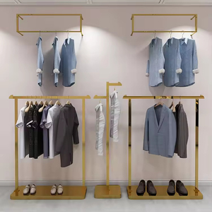 Muebles de vidrio de Metal personalizados de oro Boutique para tienda de <span class=keywords><strong>ropa</strong></span> de <span class=keywords><strong>mujer</strong></span> estante de exhibición de <span class=keywords><strong>ropa</strong></span> de <span class=keywords><strong>mujer</strong></span> soporte para uso de boda al por menor - Product Image 2