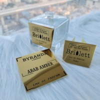 Modèle d'étiquette de produit bouteille parfum étiquette autocollant impression de logo transfert de logo personnalisé autocollants en métal de parfum de carte en relief